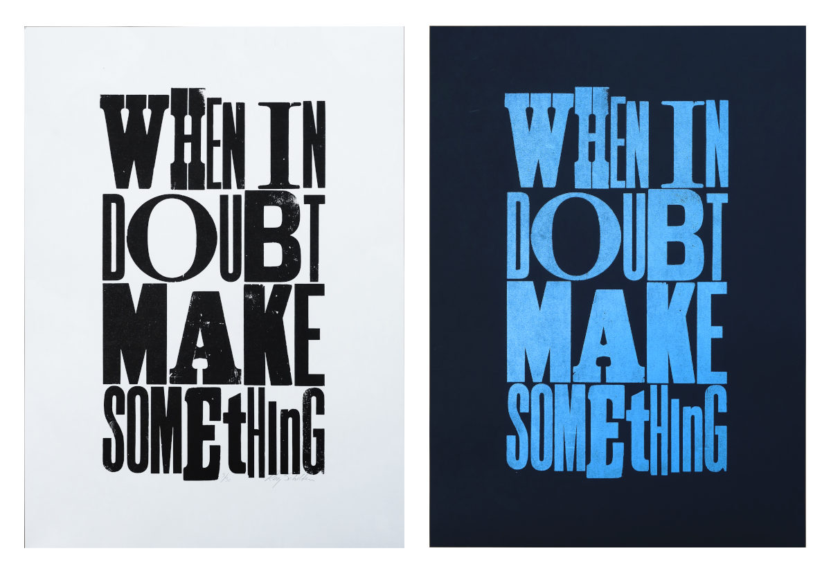 Two posters with the same design and layout but different colors. The text reads When in doubt Make something. The poster on the left is in black ink on white, the one on the right in light blue ink on black